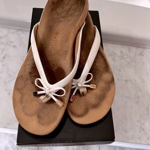 Used Good Condition-White Vionic Flip Flops (see photos for wear)